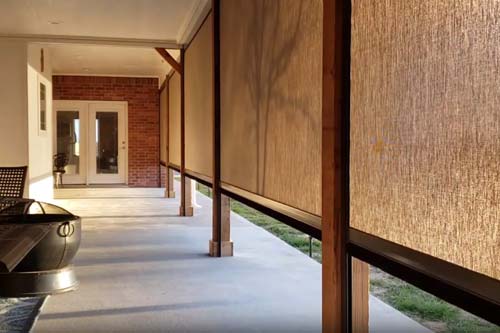 Multiple brown screens along breezeway